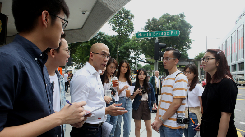 Assistant Professor Aiden Wong leading SMU students on a tour of Singapore’s Chinatown as part of Singapore Studies, a required element in the core curriculum