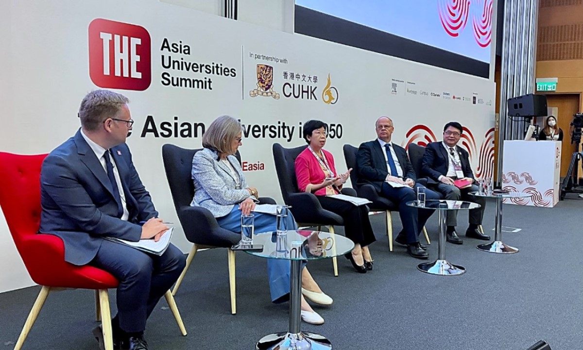 SMU President, Prof Lily Kong (centre) and fellow panellists at a panel discussion session at the THE Asia Universities Summit 2023