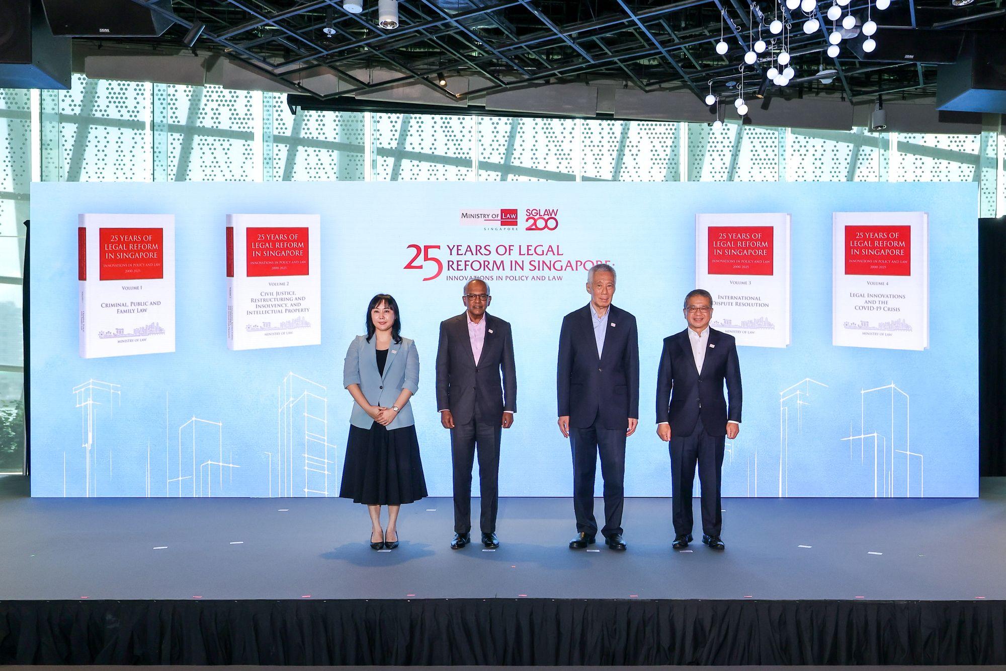 (L-R) SMU Prof Yip Man with Senior Minister K Shanmugam SC, Senior Minister Lee Hsien Loong and Minister Edwin Tong, at the book launch event (Photo credit: Ministry of Law)