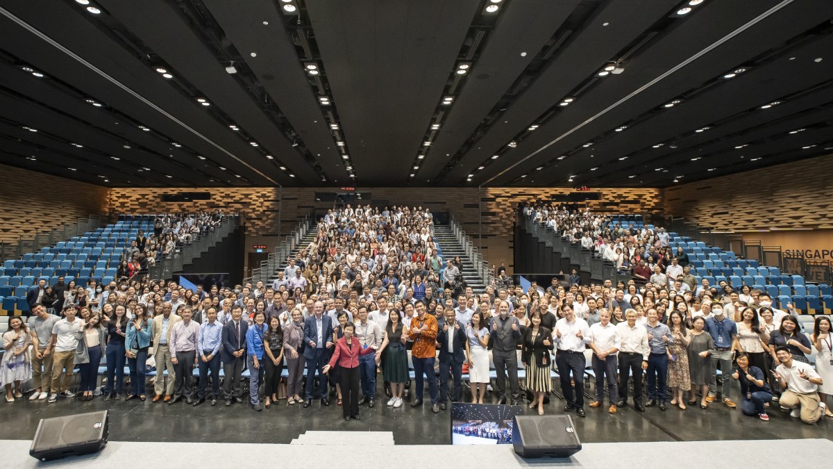 Prof Kong joined the audience in the auditorium for a group photo as One SMU.