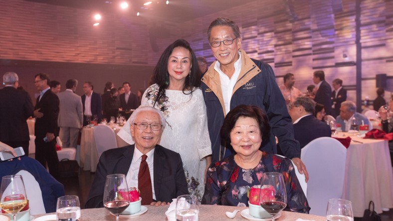 Back row: Mr Ho (right) and his wife Ms Claire Chiang. Front row: SMU Honorary Patron Dr Tony Tan (left) and his wife Mrs Mary Tan. 