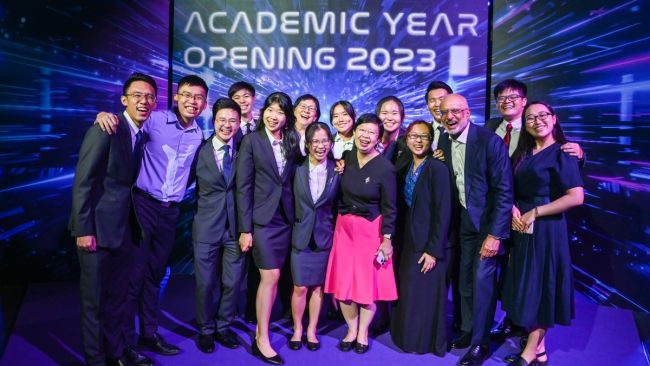 SMU Chairman Mr Piyush Gupta (front row, 2nd from right) with SMU President Prof Lily Kong (front row, 4th from right) with students at the Academic Year Opening..